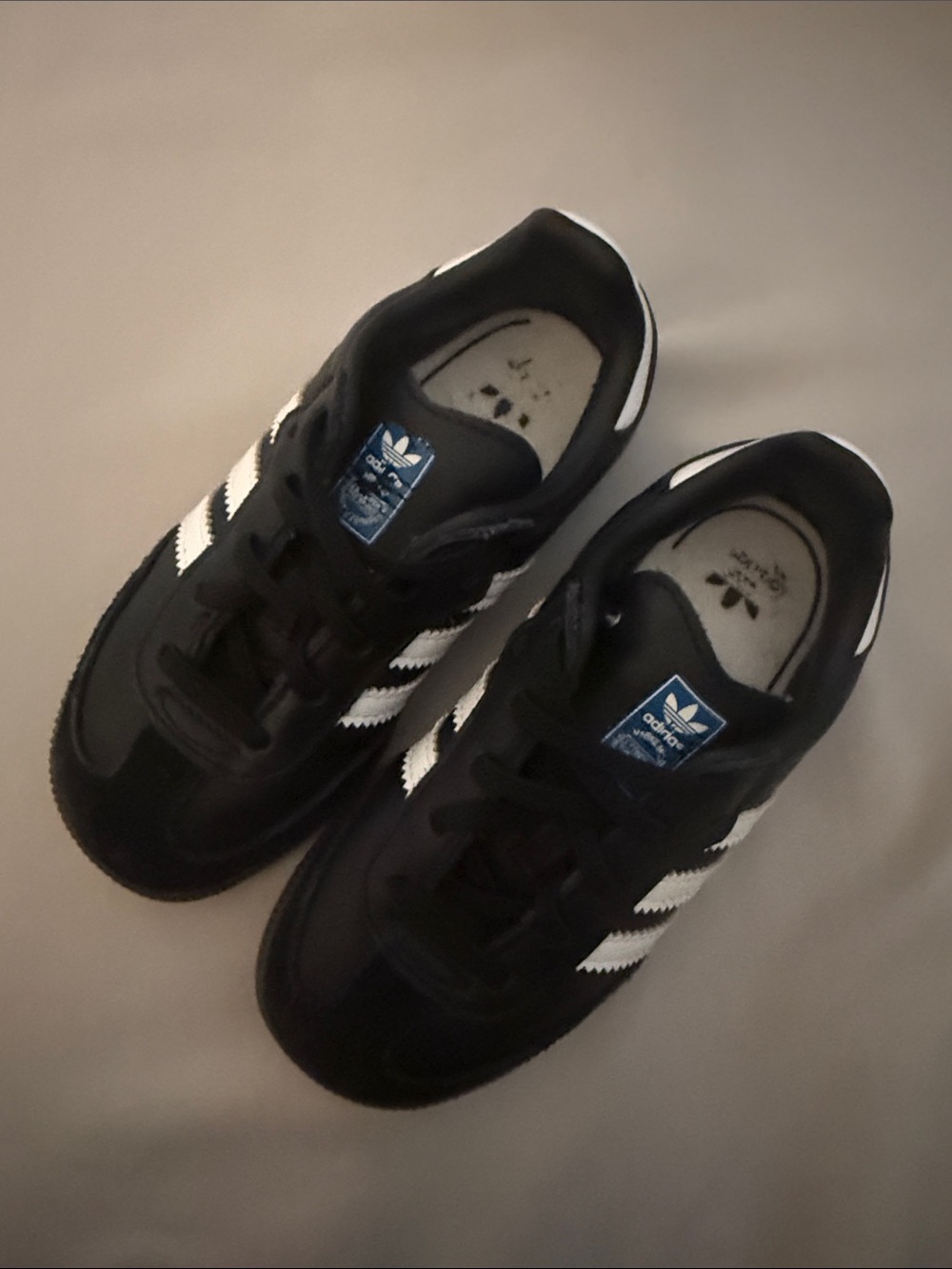 adidas Black Sneakers with White Three-Stripes and Blue Tongue Logo